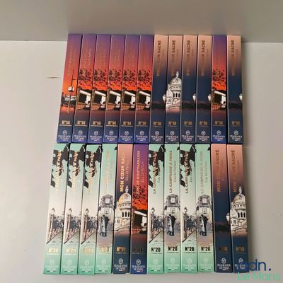 several books are stacked on top of each other on a table