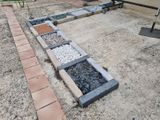 a concrete block with gravel in the middle of it
