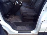 a picture of the inside of a car with the door open