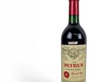 bottle of red wine on a white background with a red cap