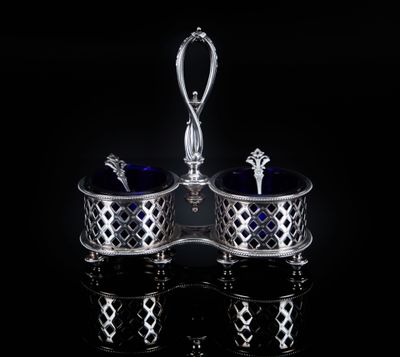 a pair of silver and blue glass salt and pepper shakers