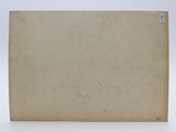 an old book sitting on top of a white surface