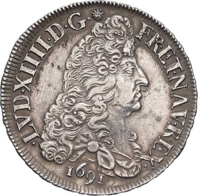 une pièce d'argent surmontée d'une couronne