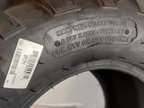 a tire that has a sticker on the side of it