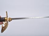 a person holding a sword in their hand