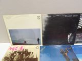 three lp ' s of the rolling stones, including the rolling stones, and the rolling stones