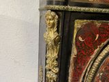 a clock that is sitting on top of a table