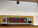 an image of a close up of a box with a clock on it