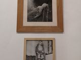 two framed pictures of a woman sitting on a couch