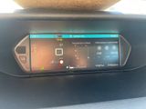 the dashboard of a car with a digital display in the center