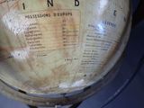 a close up of an old globe with a map on it