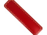 une image représentant un marque-page rouge et doré sur fond blanc