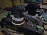 a sander that is sitting on top of a pallet