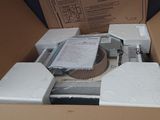 a cardboard box with a bunch of electronic equipment inside of it
