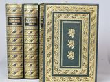 a set of three books sitting on top of each other