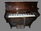 a piano that is sitting on the floor