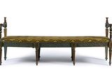a bench that is made out of wood and has a pattern on it