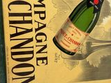 painting of a bottle of champagne and a glass of wine on a table