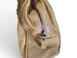 beige leather handbag on white background with zippered pocket