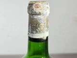 a bottle of wine that is sitting on a table