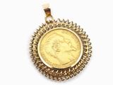 une image représentant un pendentif en forme de pièce d'or sur lequel figure le visage d'une femme