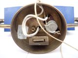 a close up of a metal object with wires attached to it