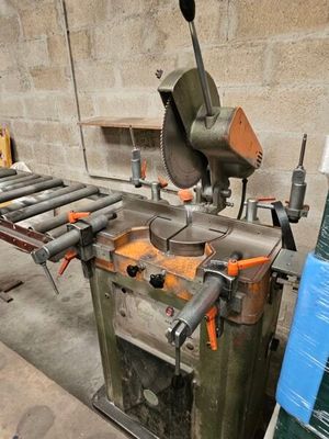 an image of a machine that is working on a piece of wood