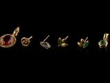 a set of five pairs of gold and garnets