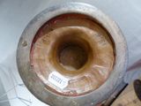 a close up of a vase with a label on it