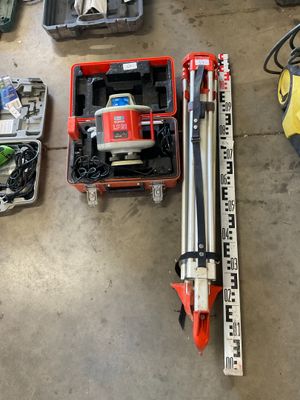 a lot of tools that are laying out on the floor