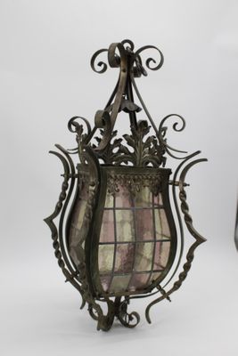 pair of antique wrought iron hanging lanterns with stained glass panels
