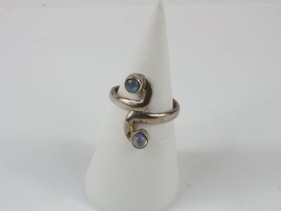 a close up of a ring with a stone on it