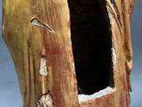 a close up of a helmet with a hole in it