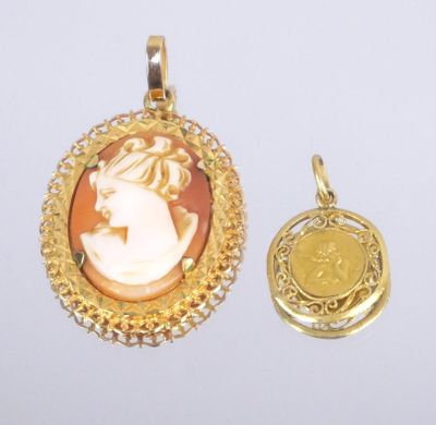 two gold and cameo cameo pendants, one with a woman ' s face