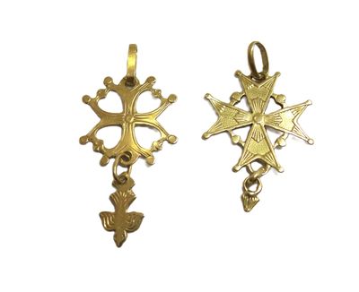 deux croix dorées et une étoile sur fond blanc