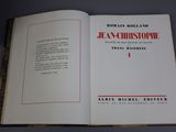 an open book with a picture of a man on it