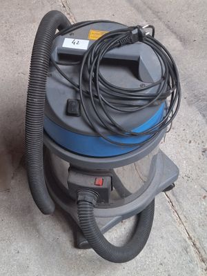 an image of a vacuum cleaner on the sidewalk