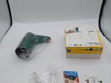 a white box with a camera and some other items on it