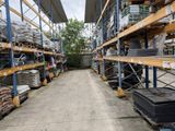 a large warehouse filled with lots of shelves filled with lots of items