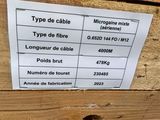 a close up of a sign on a piece of wood