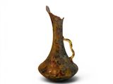 an image of a vase with a handle on a white background