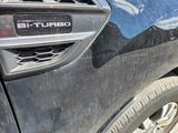 a close up of a car ' s door handle with the word bittutututututututututututututututu