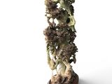 statue of broccoli on a wooden base on a white background