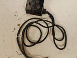 a picture of a cord that is connected to a device