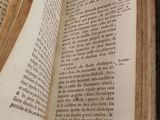 an open book that is sitting on a table