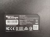 the back side of a laptop with the power cord plugged into it