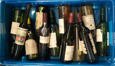 many bottles of wine sitting in a blue box