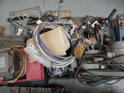 a pile of assorted items sitting on a table