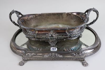a silver tray with a mirror on top of it