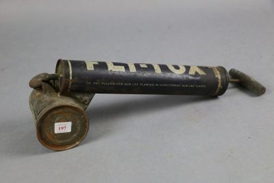 an old rusted pipe that is sitting on a table